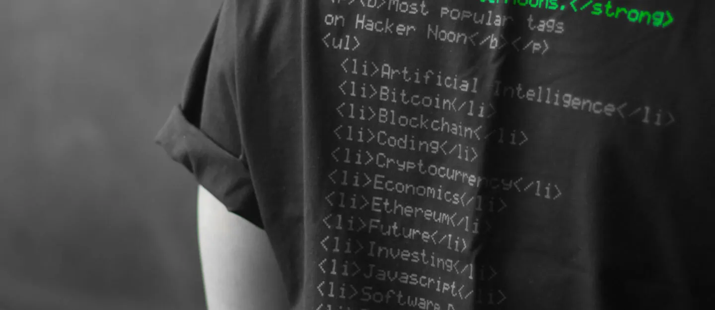 man wearing shirt with code on the back