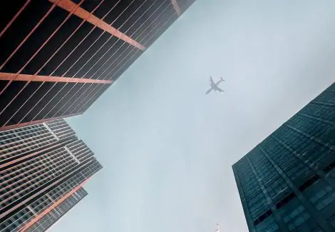 airplane over building